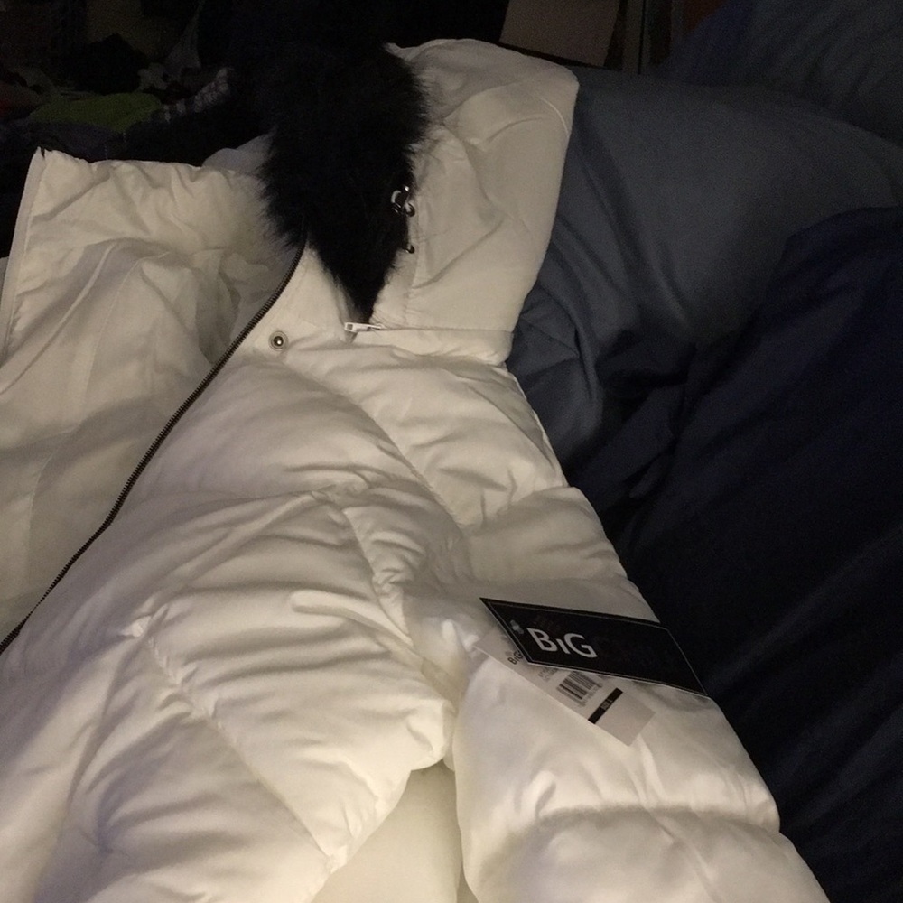 Never worn with tags.beautiful white with black faux fur puffer coat